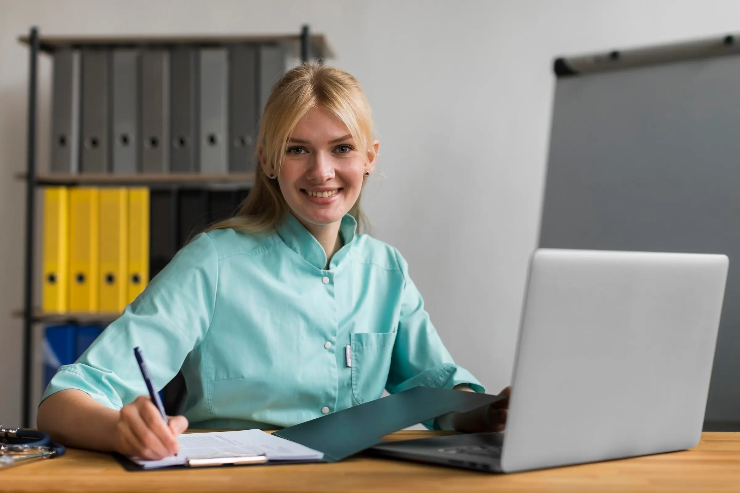 Smiley female nurse in office